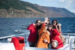 Chinese Visitors enjoy the Loch Ness by Jacobite Experience