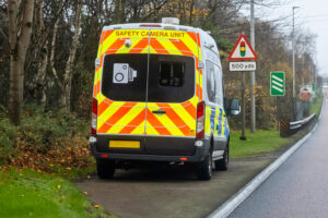 Mobile radar speed safety camera unit parked at the side of a ci